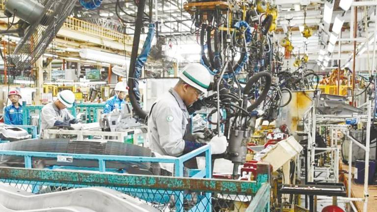 Mida says the approved investments in the first quarter, spread across 1,556 projects in manufacturing, services and primary sectors, are set to generate over 33,300 new employment opportunities for Malaysians. – Bernama filepic