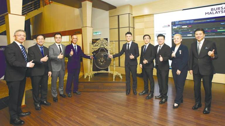 From left: M&amp;A Securities corporate finance head Gary Ting, Zantat directors Poo Lap Tuck and Chan Jee Chet, co-founder and deputy chairman Chan Hup Ooi, Chan, chairman Yap Yoon Kong, directors Gan Seng Kian and Rima Ramona Muhammad Arif and M&amp;A Equity managing director Datuk Bill Tan at the listing ceremony.