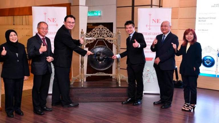 From left: Northeast Group independent non-executive director Datuk Faiza Zulkifli, Lee, managing director Ng Chay Chin, executive director Chong Ewe Hean and independent non-executive directors Ong Kim Nam and Ong Guat Ean at the company’s listing ceremony. – Northeast Group pic via Bernama