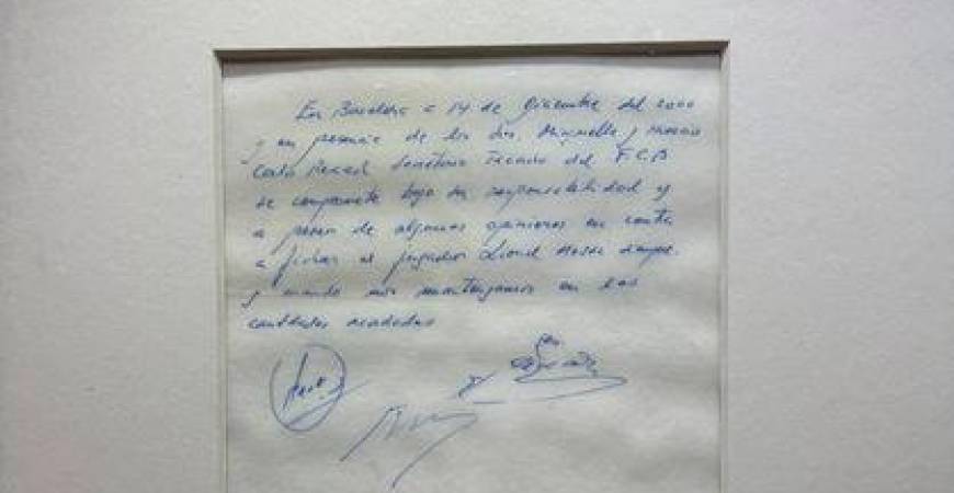 A signed and framed napkin on which soccer club Barcelona promised to sign a 13-year-old Lionel Messi is displayed at the Bonhams auction house in London, Britain May 8, 2024. - REUTERSPIX