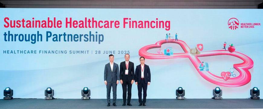 Caption: Professor Chung-mau Lo, Secretary for Health of the Hong Kong Special Administrative Region Government (centre); Mr Clement Cheung Wan-ching, Chief Executive Officer of the Insurance Authority (right); and Mr Alger Fung, Chief Executive Officer of AIA Hong Kong &amp; Macau (left), officiating the opening at the Healthcare Financing Summit
