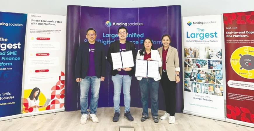 From left: Funding Societies sales and key account head Sean Hor, Chai, Ang and TASConnect (Malaysia) chief business officer Chan Tse Ning at the signing ceremony.