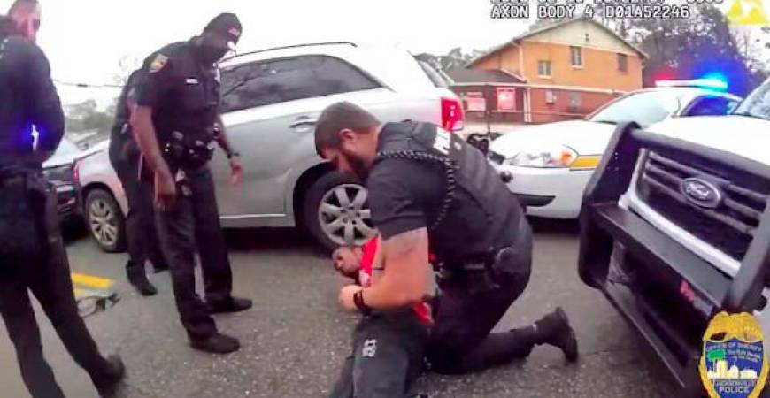 A police officer searches William McNeil Jr, 22, who is pinned on the ground after he was pulled over during a traffic stop, at an unidentified location, in Florida, U.S. February 19, 2025, in this screenshot obtained from a handout video. - Jacksonville Sheriff’s Office/Handout via REUTERSPIX