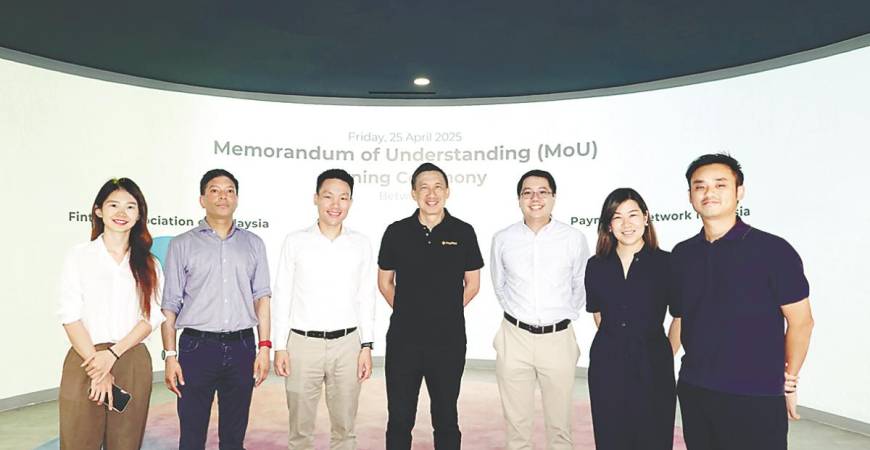 From left: FAOM community head Helena Ng, Anil, executive committee member Wilson Beh, Yeoh, committee member Marc Fong, PayNet fintech development head Quimby Sun and fintech development manager Lee Kok Yang.