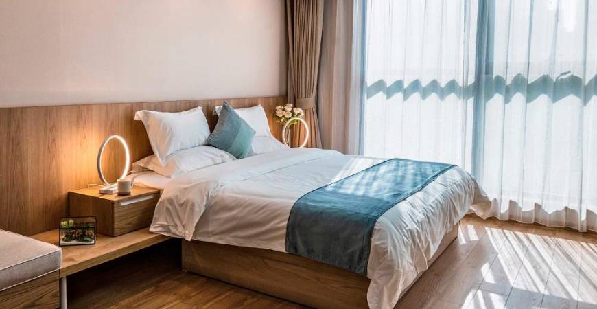 The bedroom is a sanctuary for relaxation.