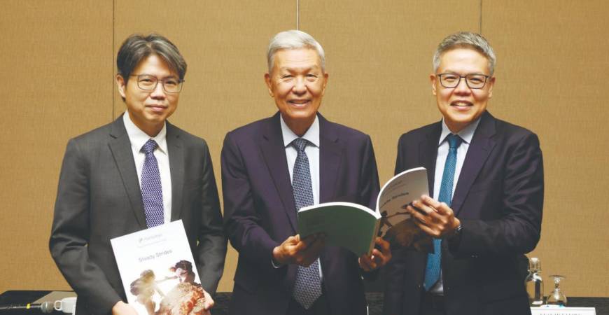 From left: Hartalega Holdings chief business officer Kuan Mun Keng, Kuan Kam Hon and Kuan Mun Leong at the press conference following the group’s 19th annual general meeting.