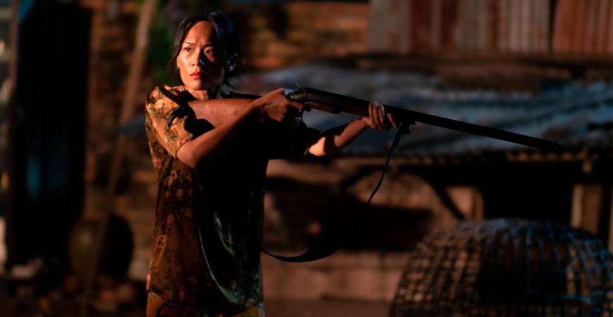 Ang as Mak Ta in Kulit Wayang.