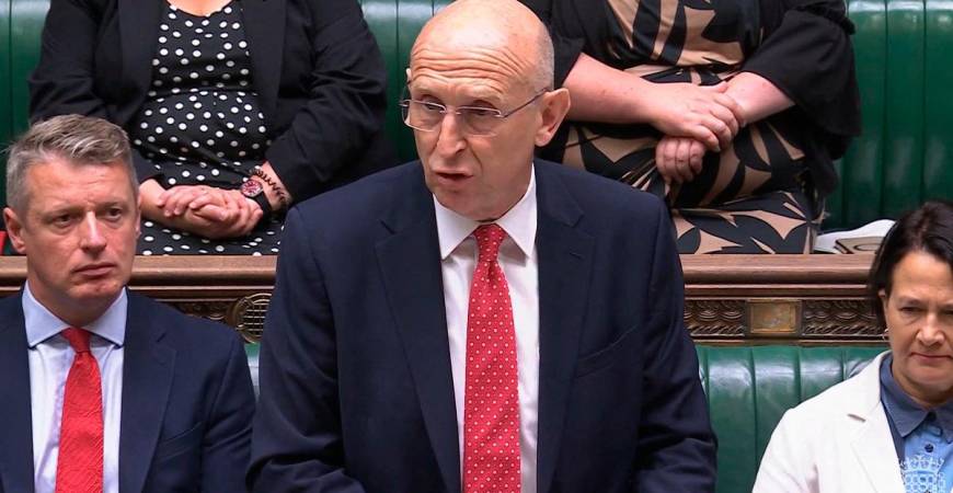 A video grab from footage broadcast by the UK Parliament's Parliamentary Recording Unit (PRU) Britain's Defence Secretary John Healey making a statement to MPs on the in the House of Commons in London on July 15, 2025, following the lifting on reporting restrictions relating to the relocation of Afghans who worked with the UK government, as a result of huge data breach in 2022. Thousands of Afghans who worked with the UK government were brought to Britain in a secret relocation programme after a huge 2022 data breach, a minister revealed Tuesday. Defence Minister John Healey told parliament about the scheme after the UK High Court lifted an order banning media from reporting that the names and details of almost 19,000 Afghans asking for asylum had been accidentally leaked just months after the Taliban seized Kabul. - AFP PHOTO / PRU