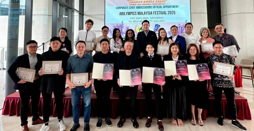 (Top row) Win Lee (4th from left) with Khatijah (5th from left) and Goh (6th from left) during the press launch of the Abilympics Malaysia Festival 2024/25 at the KL Wellness City Gallery .