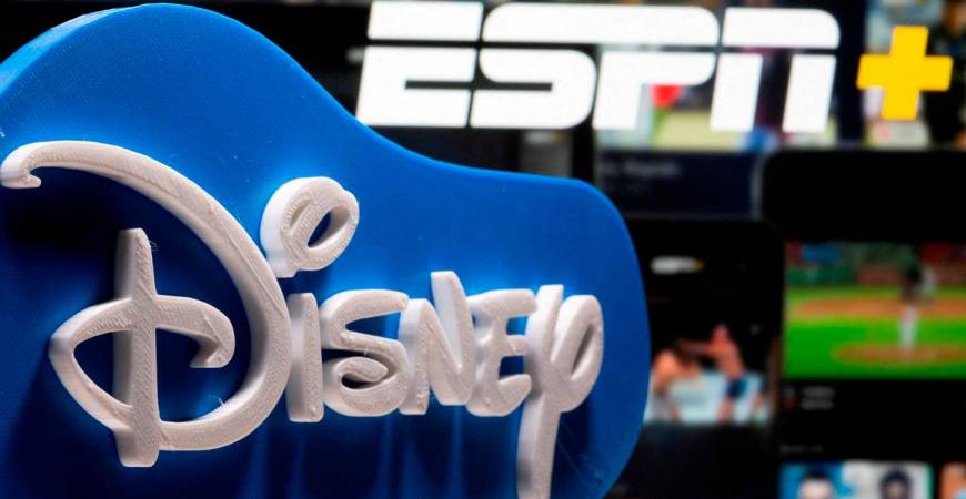 FILE PHOTO: A 3D printed Disney logo is seen in front of the ESPN+ logo in this illustration created on July 13, 2021. REUTERS/Dado Ruvic/Illustration/File Photo
