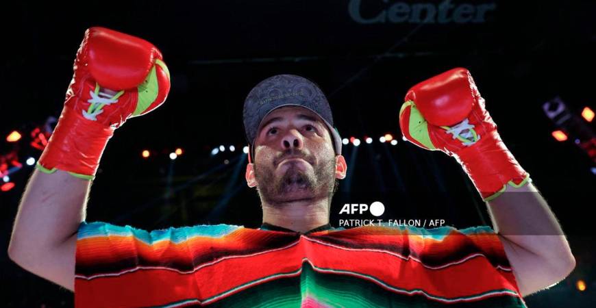 Mexico's Julio Cesar Chavez Jr. enters the ring ahead of his cruiserweight boxing bout against USA's Jake Paul at the Honda Center in Anaheim, California, on June 28, 2025. - AFP