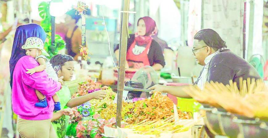 Getting children involved in food preparation and grocery shopping also makes healthy eating fun and educational. – Adib Rawi Yahya/THESUN