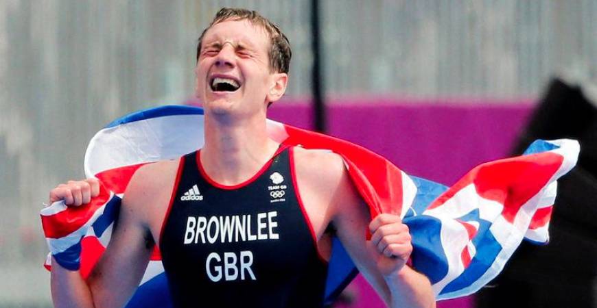 Britain's Alistair Brownlee celebrates after winning in the men's triathlon final during the London 2012 Olympic Games at Hyde Park August 7, 2012. - REUTERSPIX