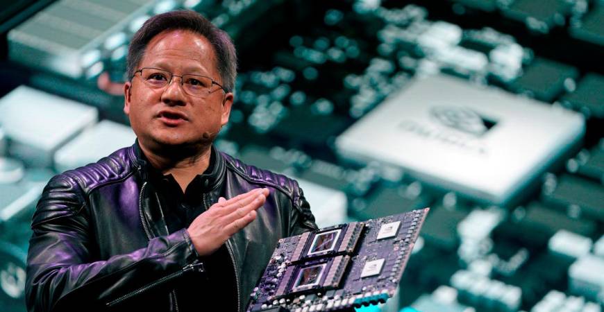 - Jensen Huang, CEO of Nvidia, shows the Drive Pegasus robotaxi AI computer at his keynote address at CES in Las Vegas, Nevada, U.S. January 7, 2018. REUTERS/Rick Wilking