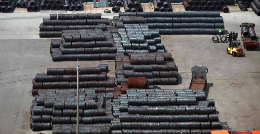 Steel coils are seen at a port in Pyeongtaek on July 31, 2025. US President Donald Trump said on July 30, that the United States will impose a 15 percent tariff on imports from South Korea, as he touted a full and complete trade deal between both countries. - AFPPIX