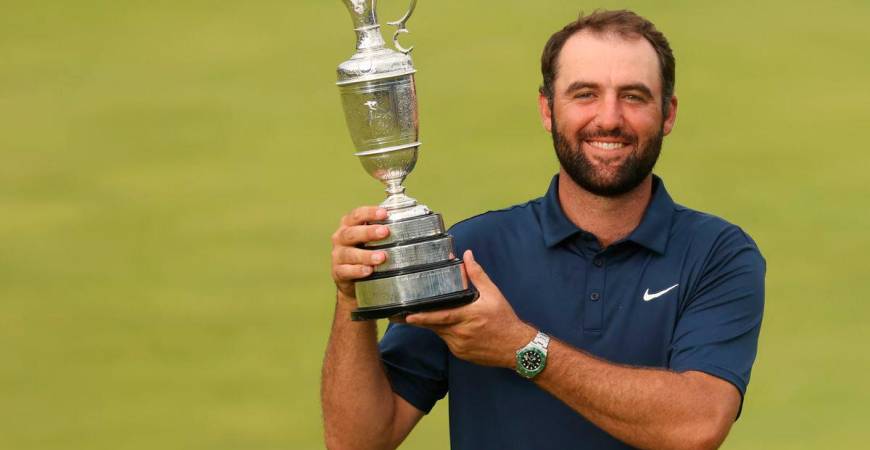 Scottie Scheffler celebrates with the Claret Jug after winning the 153rd Open Championship golf tournament at Royal Portrush. Mike Frey-Imagn Images