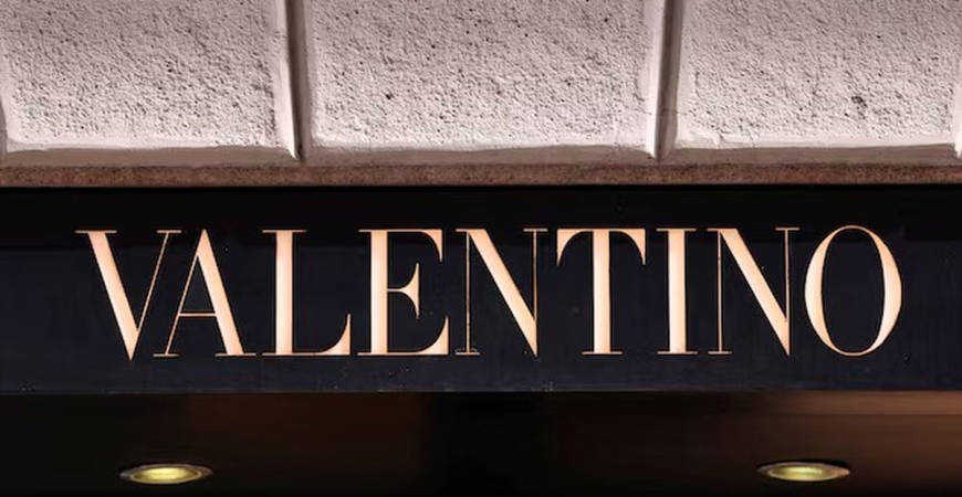 The logo of fashion house Valentino is seen outside a shop in Milan, Italy, April 8, 2024. - REUTERS