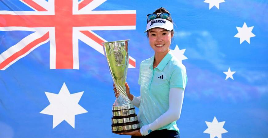 Australia’s Grace Kim poses with the trophy after her victory on the first playoff hole after the final round of the Amundi Evian Championship at Evian Resort Golf Club, in Evian-Les-Bains, eastern France. – LPGA/Getty Images