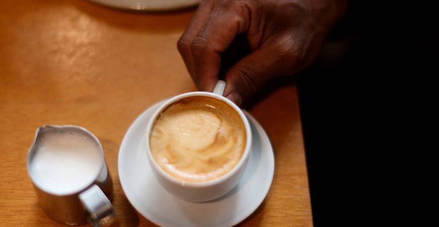 A person takes a coffee at a coffee shop in Rio de Janeiro, Brazil July 10, 2025. REUTERS