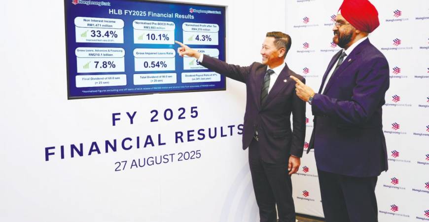 Lam and Hong Leong Bank chief financial officer Malkit Singh at the briefing.