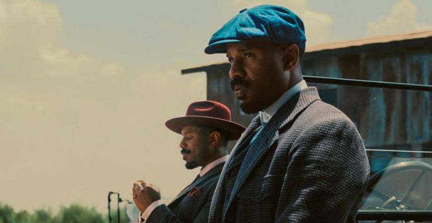 Jordan takes on dual duties playing Stack (left) and Smoke. – ALL PICS FROM WARNER BROS PICTURES