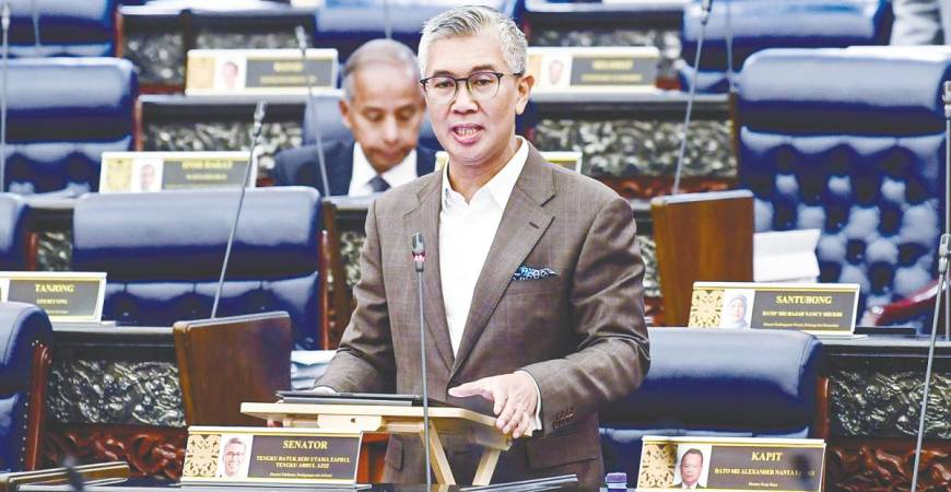 Tengku Zafrul speaking during a ministerial briefing on reciprocal trade negotiations with the US in the Dewan Rakyat today. – Bernamapic