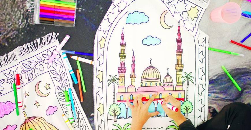 The interactive prayer mats that children can colour while learning about sacred Islamic landmarks. – Pic courtesy of The Bayan Collection