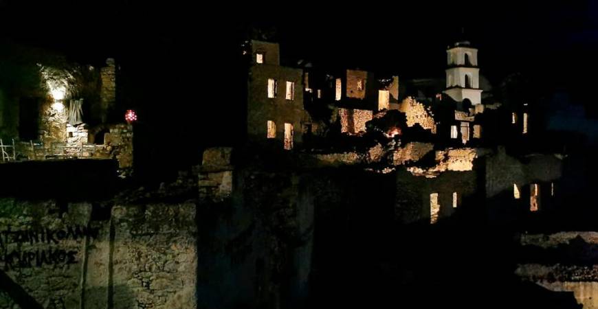 This photo taken on September 10, 2020, shows Mikro Chorio (that means Little Village in Greek) on the Greek Aegean island of Tilos. The abandoned village of Mikro Chorio, the ancient capital of the Greek island of Tilos, like many other ghost villages in Greece, is being brought back to life through tourism. / AFP / Chantal VALERY