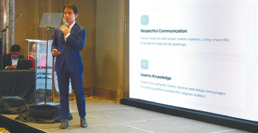 Fadzli speaking at the launch of NurAI/