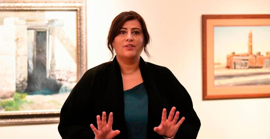 Manal Ataya, director-general of the Sharjah Museum Authority, speaks during an interview with AFP at the Sharjah Art Museum on August 24, 2020. AFP / Karim SAHIB