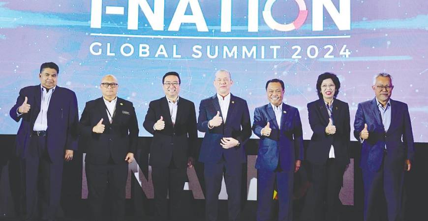 Deputy Prime Minister Datuk Seri Fadillah Yusof (centre) and Chang (third from left) with other dignitaries at the launch of i-Nation Global Summit 2024 today. – Bernamapic