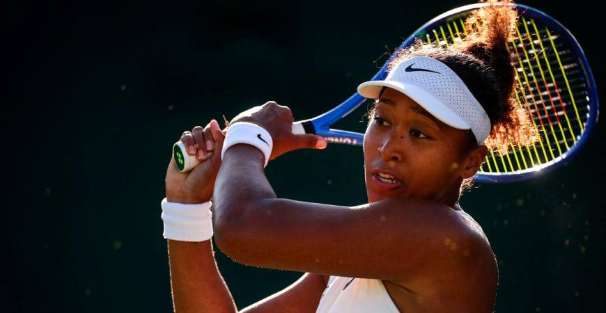 Japan’s Naomi Osaka reacts as she plays against Czech Republic’s Katerina Siniakova during their women’s singles second round tennis match on the third day of the 2025 Wimbledon Championships at The All England Lawn Tennis and Croquet Club in Wimbledon, southwest London, on July 2, 2025- AFP