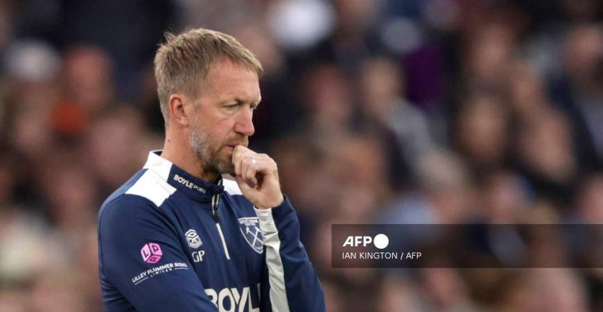 West Ham United's English head coach Graham Potter looks on the touchline withe the score at 0-3 in the second half during the English Premier League football match between West Ham United and Tottenham Hotspur at the London Stadium, in London on September 13, 2025. - AFP