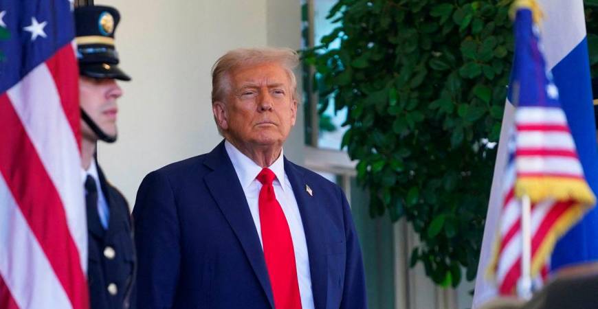 U.S. President Donald Trump looks on before welcoming Finland’s President Alexander Stubb at the White House in Washington, D.C., U.S., on October 9, 2025. REUTERS/Nathan Howard