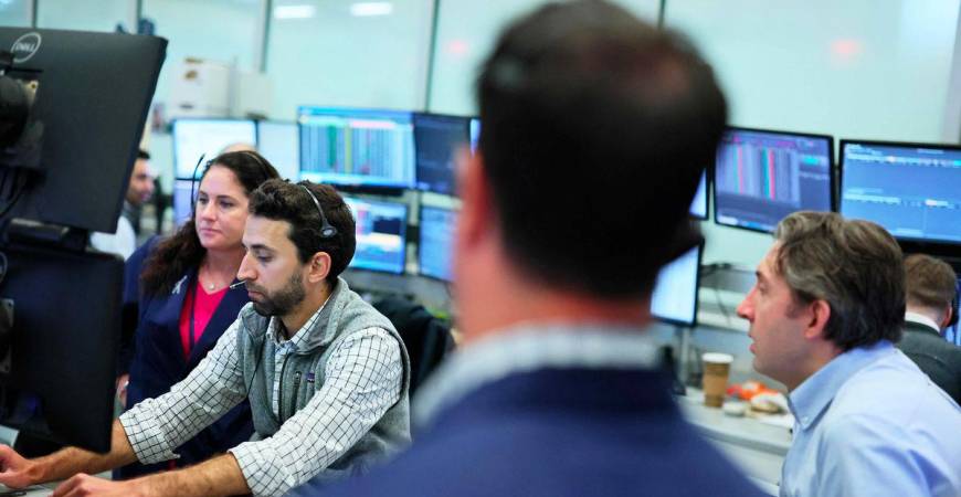 Traders work on the floor of the New York Stock Exchange during morning trading on June 16, 2025 in New York City. - AFPPIX