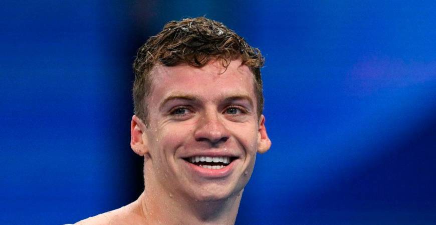 (FILES) Gold medallist France’s Leon Marchand reacts after competing in the final of the men’s 200m individual medley swimming event during the Paris 2024 Olympic Games at the Paris La Defense Arena in Nanterre, west of Paris, on August 2, 2024. Photo by Oli SCARFF / AFP