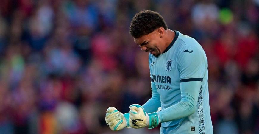 Villarreal's Brazilian goalkeeper #01 Luiz Reis Junior celebrates after winning the Spanish league football match between FC Barcelona and Villarreal CF at Estadi Olimpic Lluis Companys in Barcelona on May 18, 2025. - AFPPIX