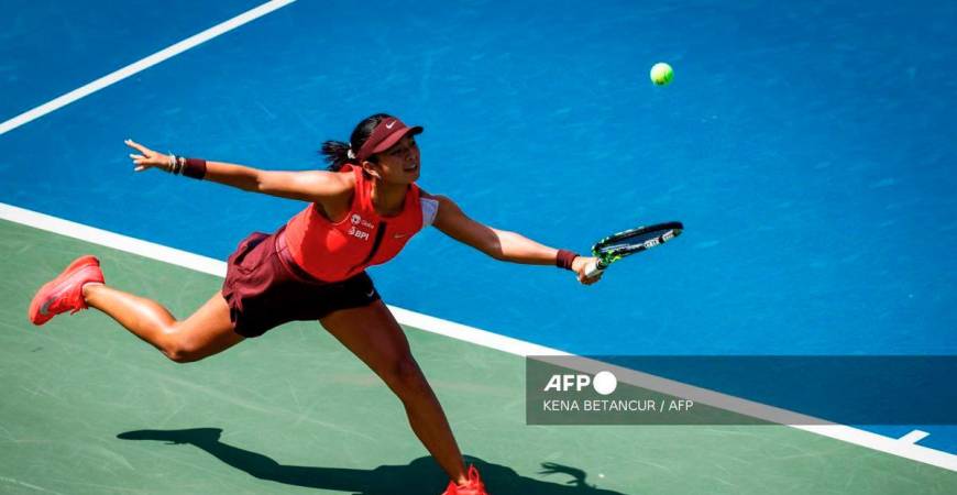 Philippines' Alexandra Eala plays a return to Denmark's Clara Tauson during their women's singles first round tennis match on day one of the US Open tennis tournament at the USTA Billie Jean King National Tennis Center in New York City, on August 24, 2025. - AFP