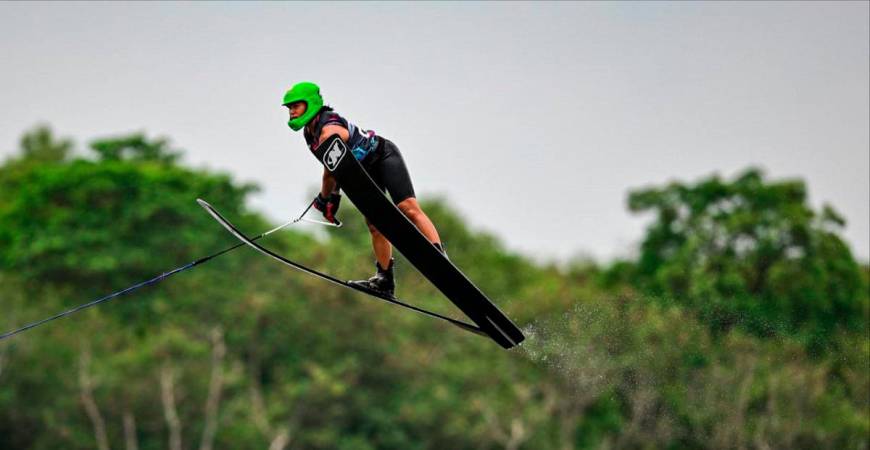 Aaliyah soaring into the sky in her jump event
