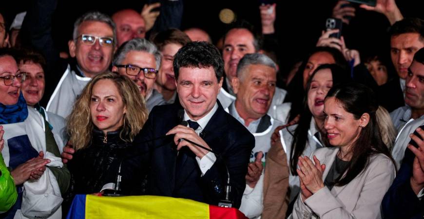 Presidential candidate Nicusor Dan speaks as he reacts to exit polls of Romania's second round of the presidential election, in Bucharest, Romania, May 18, 2025. - REUTERSPIX