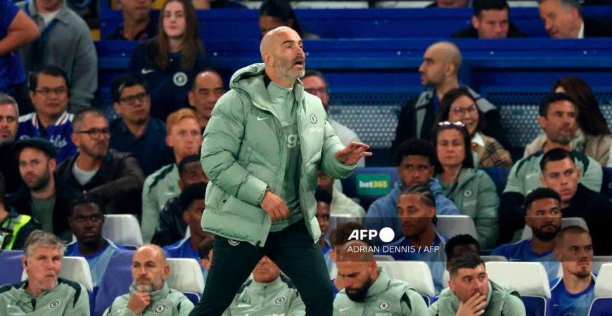 Chelsea's Italian head coach Enzo Maresca shouts instructions to his players from the touchline during the UEFA Champions League, league phase football match between Chelsea and Benfica at Stamford Bridge in London on September 30, 2025. - AFP