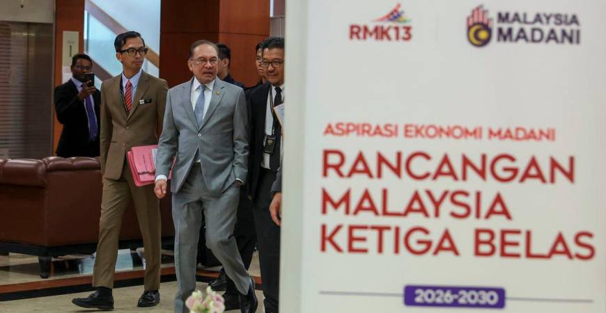Prime Minister Datuk Seri Anwar Ibrahim arriving at the Dewan Negara to present the 13th Malaysia Plan (RMK13) on August 25, 2025. - BERNAMA