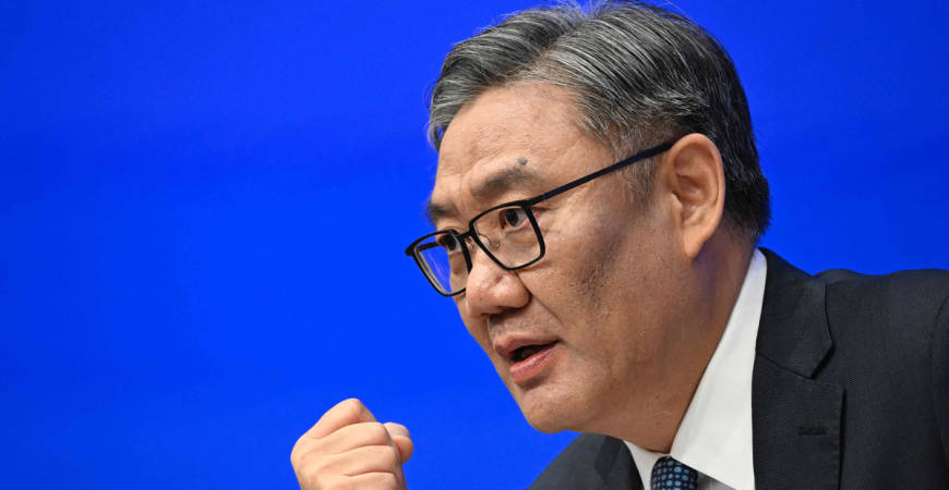 Wang Wentao, China’s Minister of Commerce, speaks during a press conference in Beijing on July 18, 2025. China's economy is still facing a very severe and complex situation, its minister of commerce said on July 18, suggesting the government would take action to counter challenges ahead. - AFP