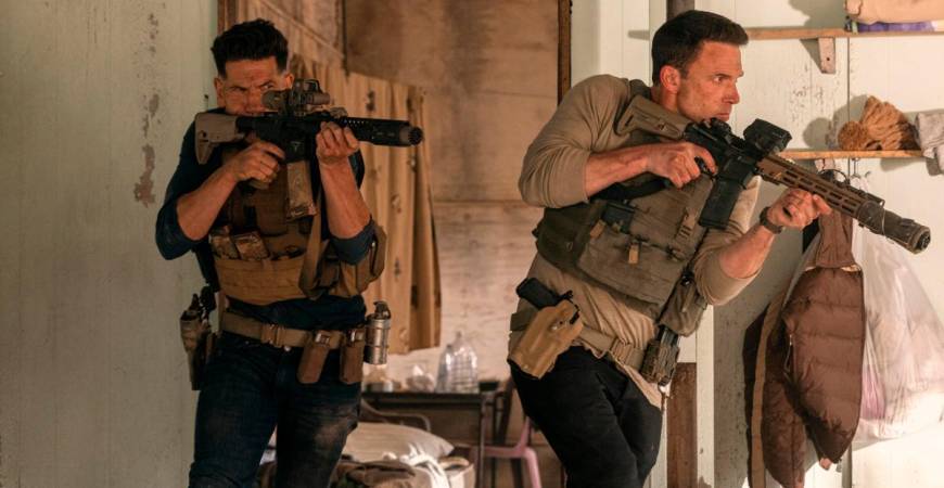 (From right) Christian (Affleck) and Brax (Bernthal) team up once again, bringing brotherly tension and firepower to the mission.
