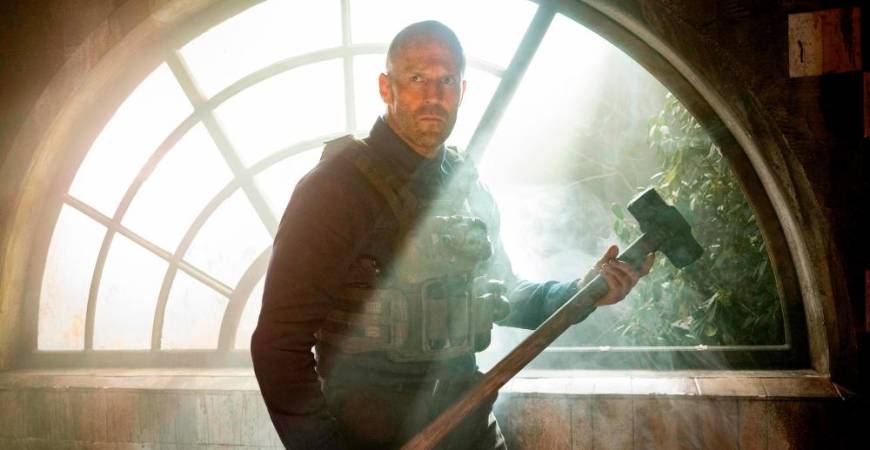 Statham is back in action mode, trading blueprints for bullets as a no-nonsense ex-commando.