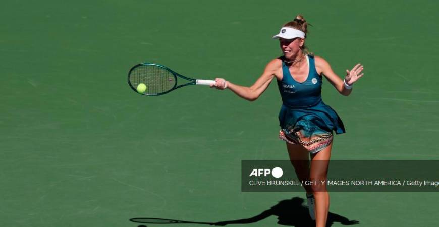 NEW YORK, NEW YORK - AUGUST 30: Magdalena Frech of Poland returns to Coco Gauff of the United States during their Women's Singles Third Round match on Day Seven of the 2025 US Open at USTA Billie Jean King National Tennis Center on August 30, 2025 in the Flushing neighborhood of the Queens borough of New York City. Clive Brunskill/Getty Images/AFPPIX