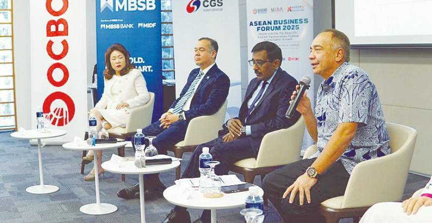 Nazir speaking to reporters at the curtain raiser to Asean Business Forum 2025 today. With him are, from left, OCBC Malaysia managing director, senior banker and head of investment banking Tan Ai Chin, Azlan and Sivasuriyamoorthy.