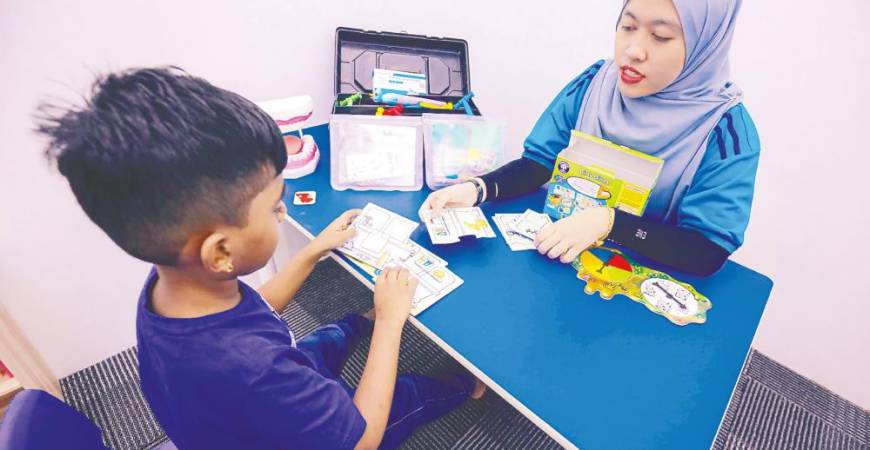 Kok said activities such as play and conversation are vital for children to develop communication skills in a natural and engaging way. – ADIB RAWI YAHYA/THESUN