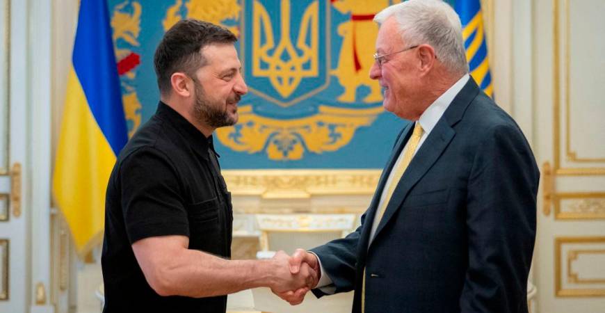 Ukraine’s President Volodymyr Zelenskiy shakes hands with U.S. Special Envoy for Ukraine Keith Kellogg. Credit: Ukrainian Presidential Press Service/Handout via REUTERS