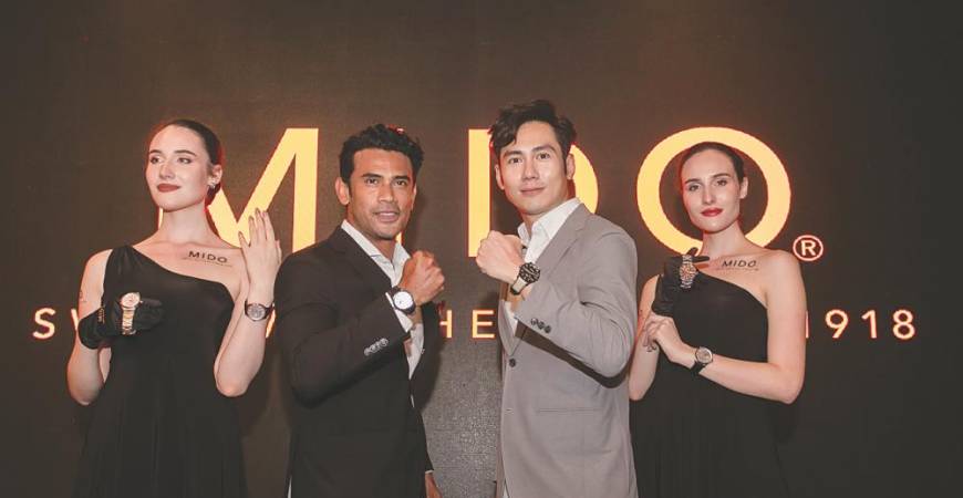 Remy Ishak (L) and JC Chee flanked by the models.